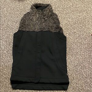 The North Face women’s green vest with faux fur trim